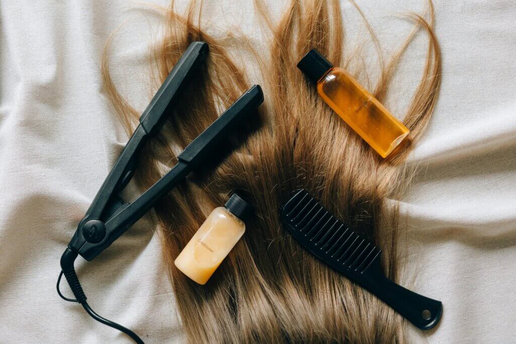 Close-up of shiny, straight hair after a keratin treatment in West Palm Beach, showcasing the results of different types of keratin treatments.