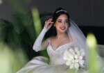Romantic bridal portrait showcasing the best makeup for wedding day with soft eyeshadow and glowing skin