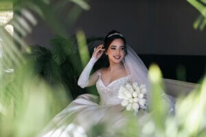 Romantic bridal portrait showcasing the best makeup for wedding day with soft eyeshadow and glowing skin